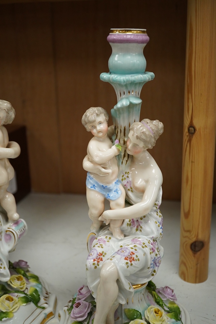 A pair of Jacob Petit porcelain figural candlesticks, 34cm
